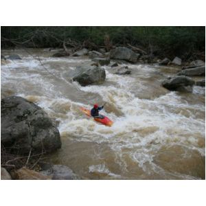 Bob Maxey hitting the main hole in the big South Fork rapid (Photo by Lou Campagna - 4/26/04)