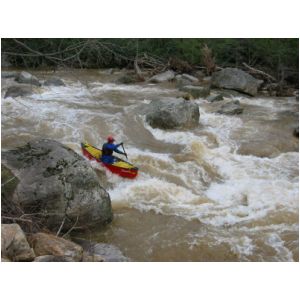 Scott Gravatt trying to avoid main hole in the big South Fork rapid (Photo by Lou Campagna - 4/26/04)