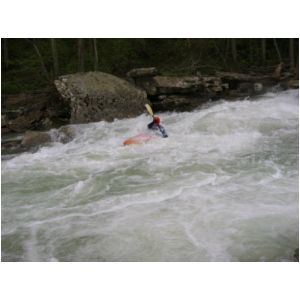 Bob Maxey finishing Bridge Rapid (Photo by Scott Gravatt - 4/27/04)