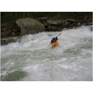 Keith Merkel finishing Bridge Rapid (Photo by Scott Gravatt - 4/27/04)