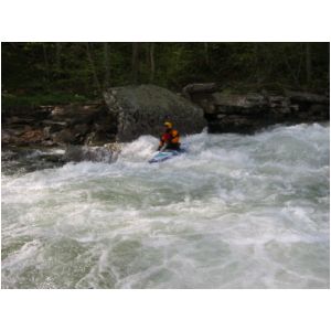 Scott Zetterstrom finishing Bridge Rapid (Photo by Scott Gravatt - 4/27/04)