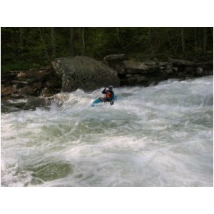 Marilyn Jones finishing Bridge Rapid (Photo by Scott Gravatt - 4/27/04)