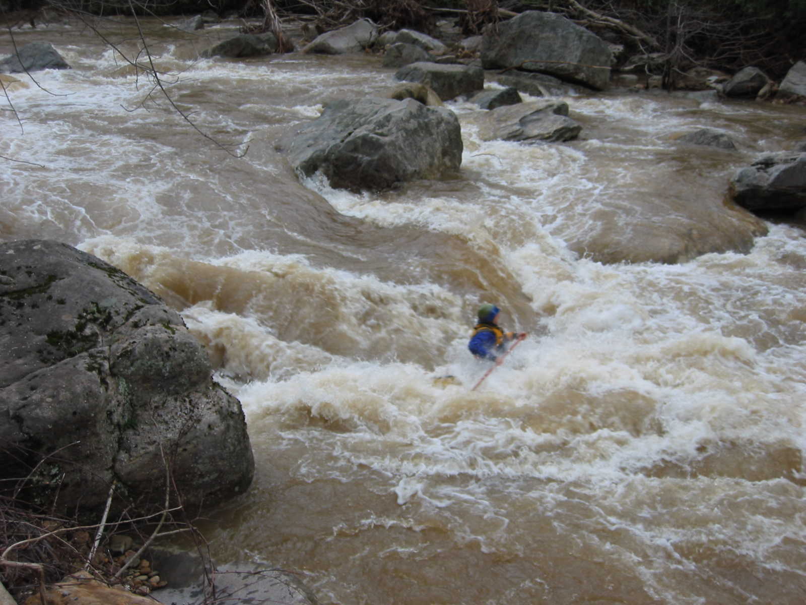 Jim Pruitt burying canoe in main hole of the big South Fork rapid (Photo by Lou Campagna - 4/26/04)