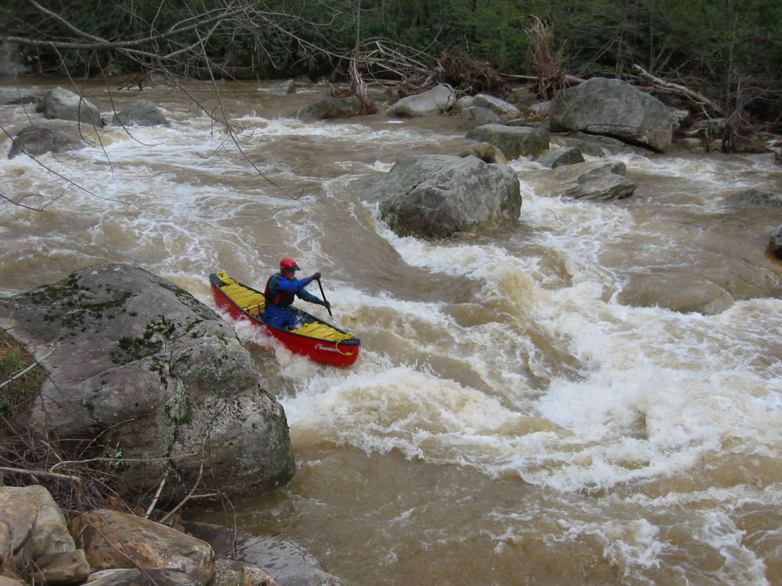 Scott Gravatt trying to avoid main hole in the big South Fork rapid (Photo by Lou Campagna - 4/26/04)