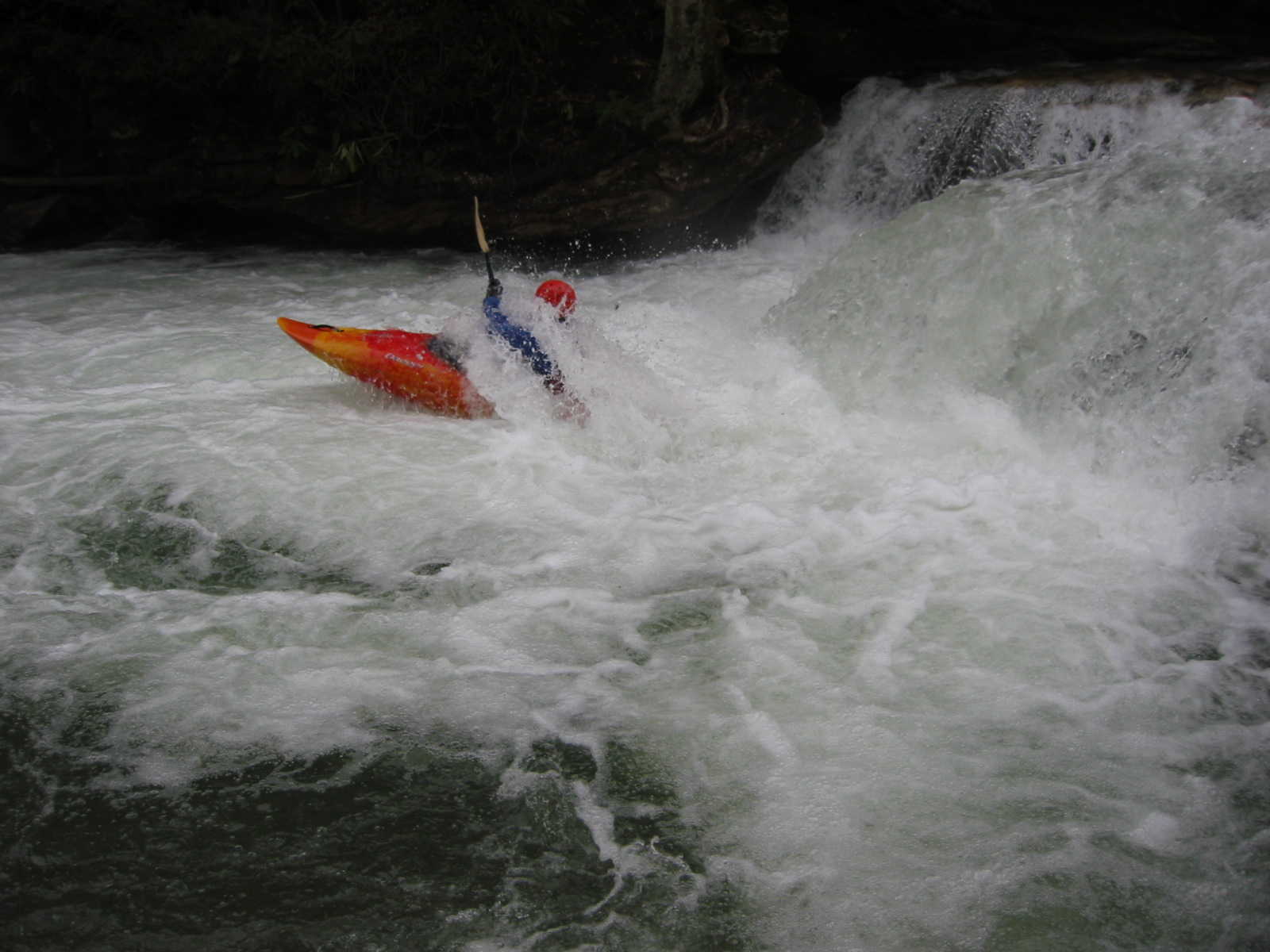 Bob Maxey running Sugar Creek ledge (Photo by Scott Gravatt - 4/27/04)