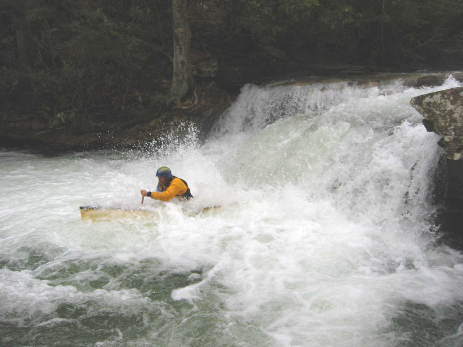 Jim Pruitt running Sugar Creek ledge (Photo by Scott Gravatt - 4/27/04)