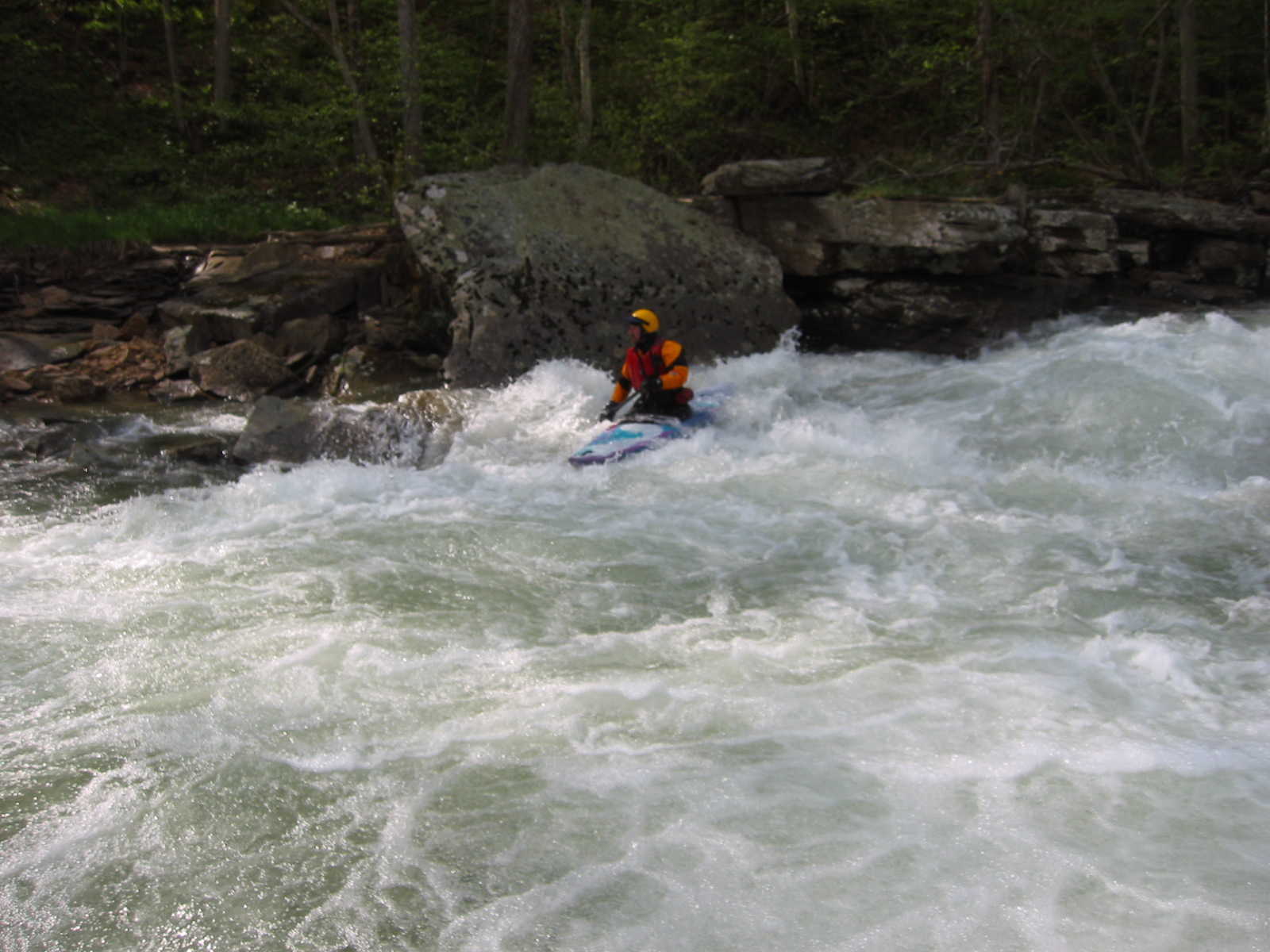 Scott Zetterstrom finishing Bridge Rapid (Photo by Scott Gravatt - 4/27/04)