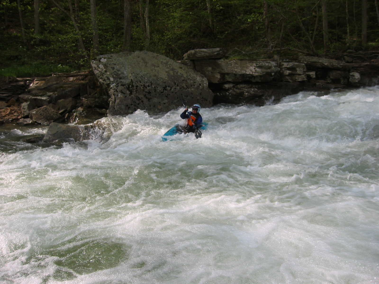 Marilyn Jones finishing Bridge Rapid (Photo by Scott Gravatt - 4/27/04)