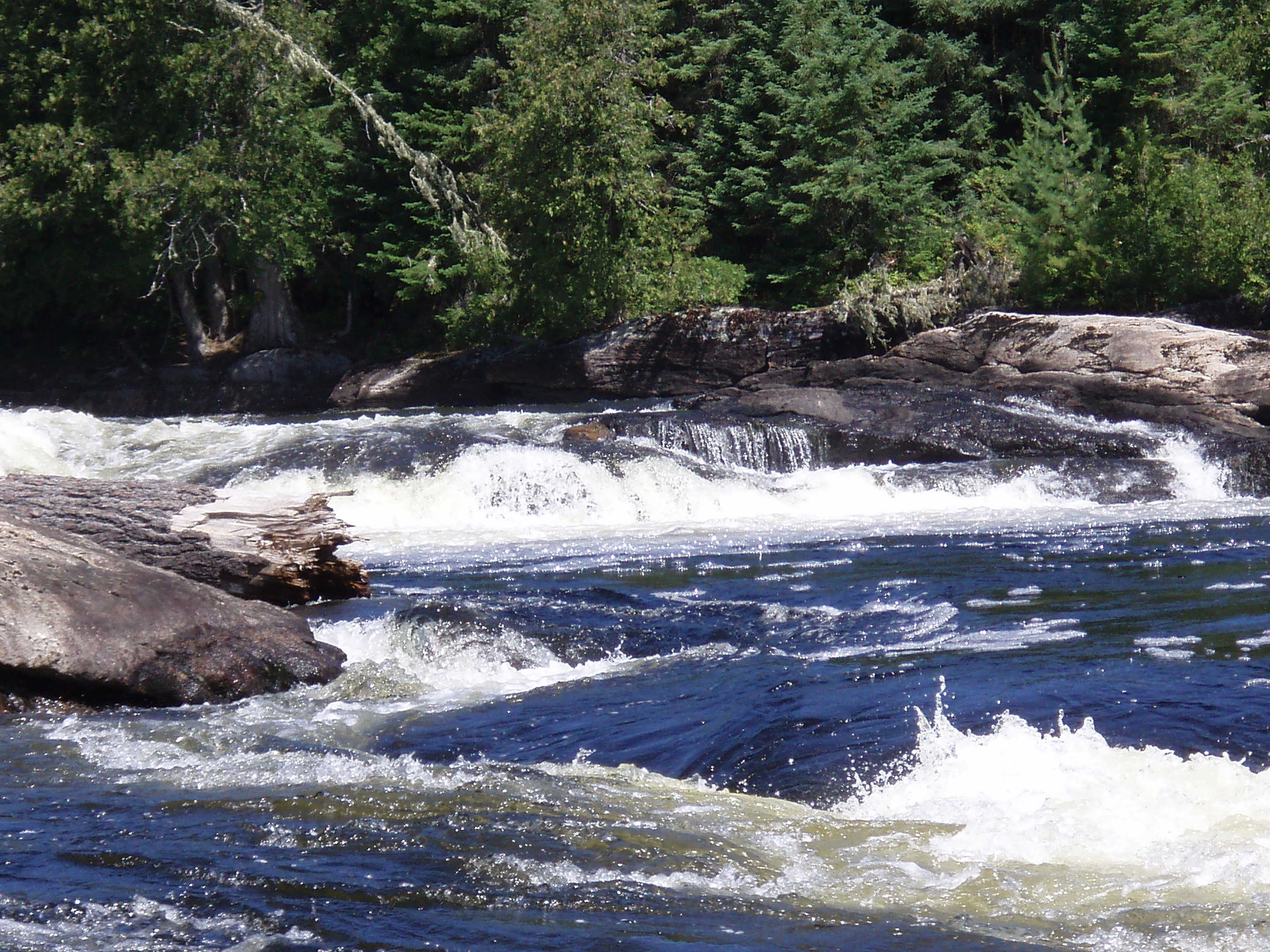 Looking up at the river left side of the first drop of 'Rapides Penches'(Photo by Keith Merkel - 8/7/07)