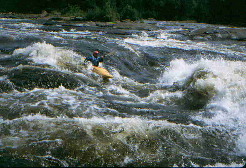 Keith Merkel before big wave in long Class 3-4 rapid  (Photo by Bob Maxey - 7/27/01)