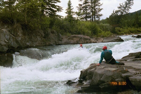 Bob Maxey hidden in Put_In Ledge on the Castle River (Lee Belknap taking picture) (Photo by Keith Merkel - 6/30/99)