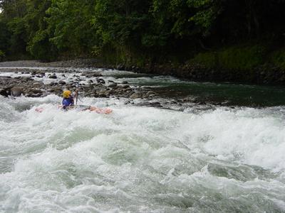 Cary Singer swings wide to avoid the strainer/tree (Photo by Court Ogilvie - 11/02)