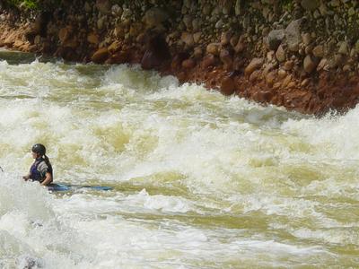 River guide and instructor par excellence Amy Brown (Barb's
daughter) waiting patiently for carnage in an eddy below Wallshot Rapid
(Photo by Court Ogilvie - 11/02)