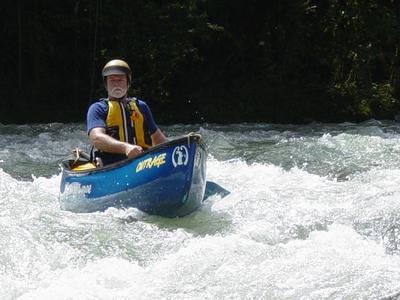 Buttleman again refusing to smile and completely unaware of
the large rock Court hid in his boat at the lunchstop (Photo by Court Ogilvie - 11/02)