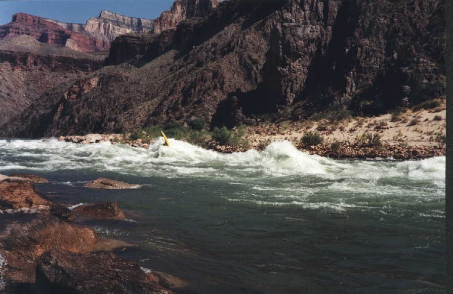 Keith Merkel back endering on big wave in Hermit (1996)