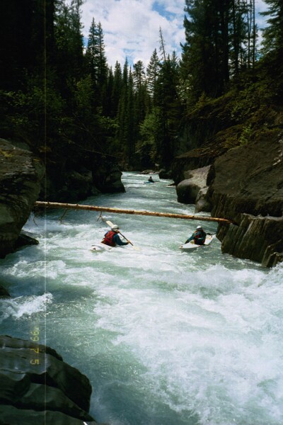 Cahil Converse entering mini-canyon joining Robert Goo and Bob Maxey (Photo by Keith Merkel - 7/5/99)