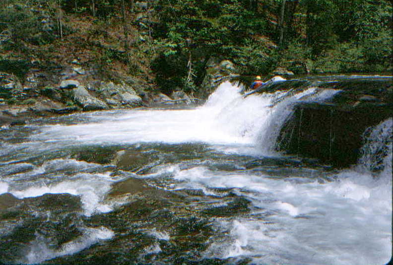 Scott Zetterstrom running one of several ledges above Baby Falls (Photo by Bob Maxey - 4/28/00)
