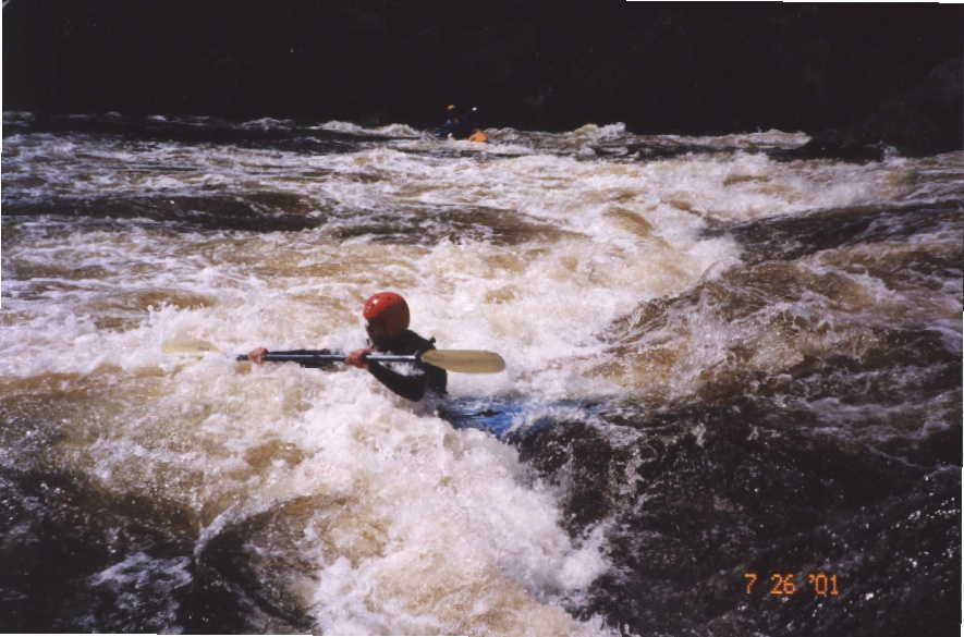 Bob Maxey continuing down Island Rapid (Photo by Keith Merkel - 7/26/01)