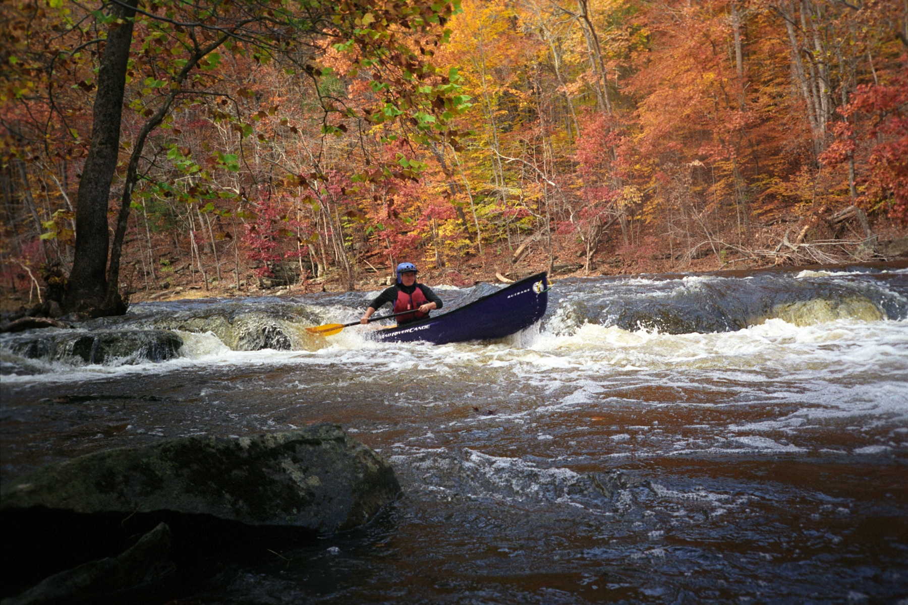 Angie Sigmund paddling the first ledge (Photo by Beth Koller - 11/5/05)